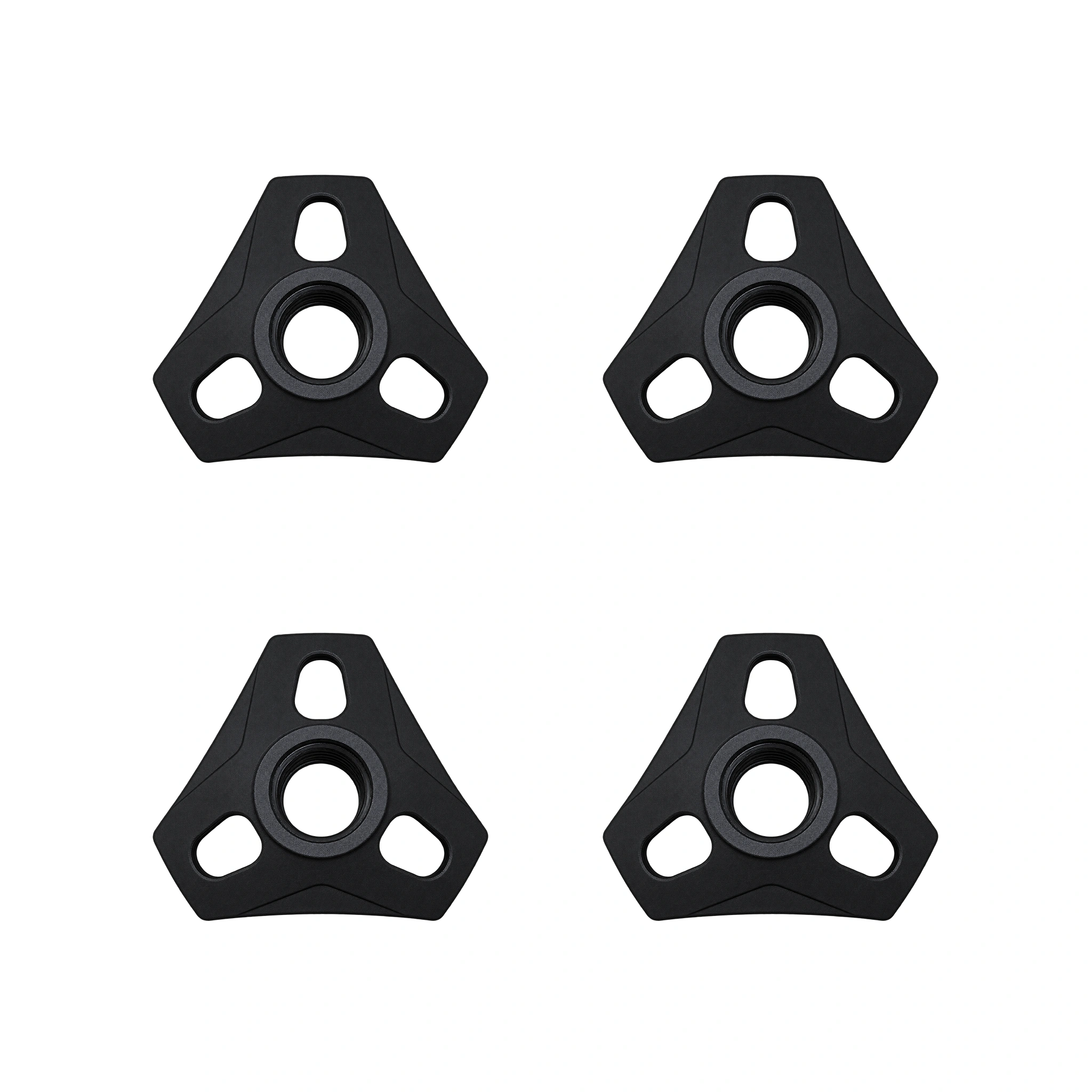 Four black trekking pole mud baskets included in the 4-pack.