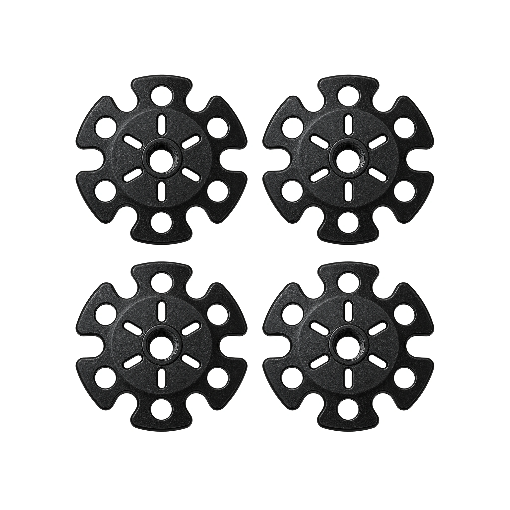 Four black trekking pole snow baskets included in the 4-pack.